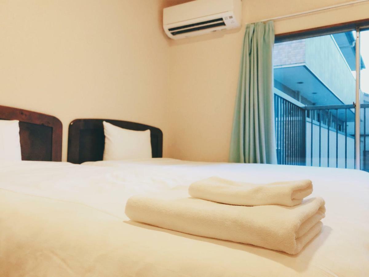 Kyoto Shijo Guest House Ayaomiya Villa Bagian luar foto
