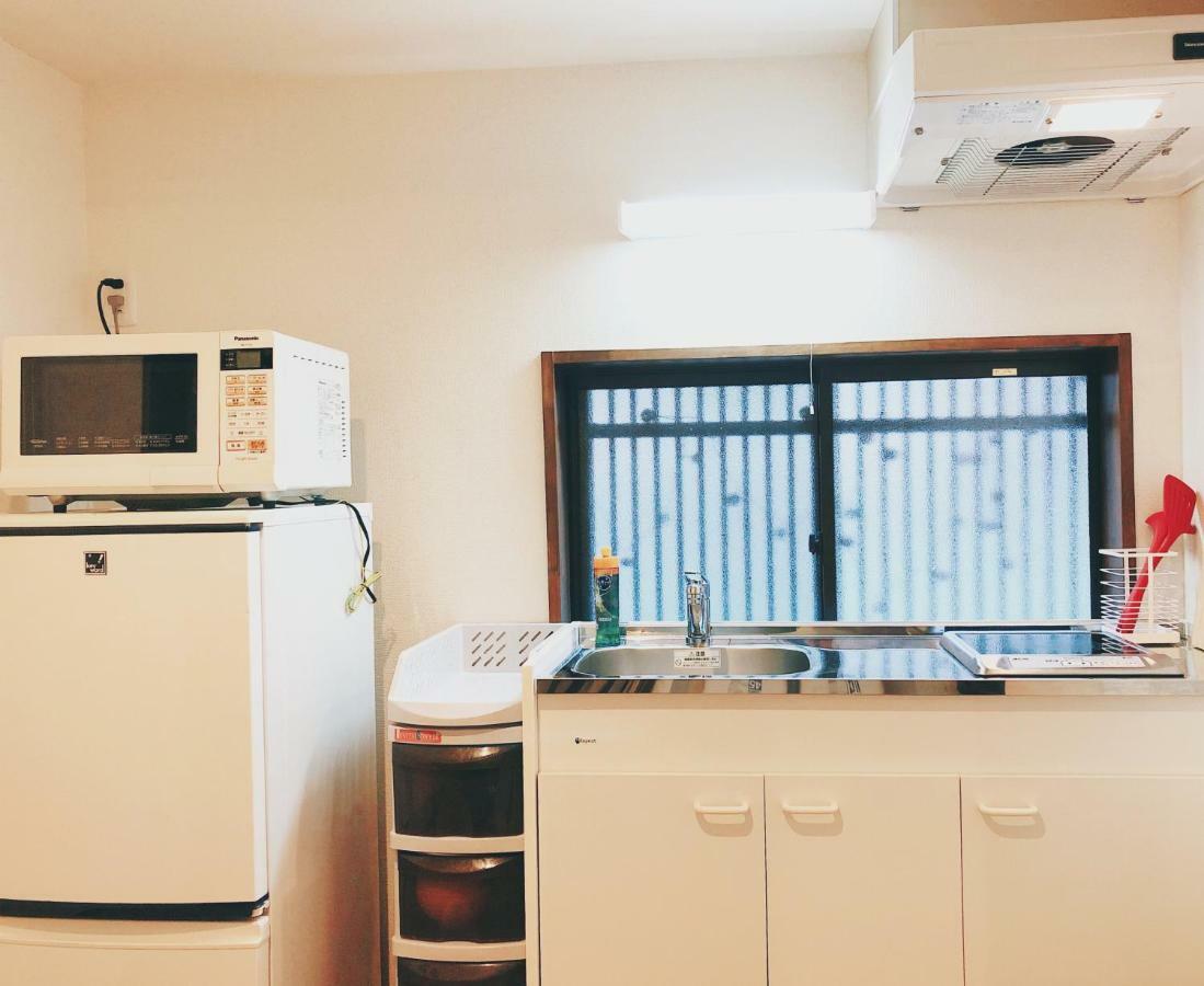 Kyoto Shijo Guest House Ayaomiya Villa Bagian luar foto